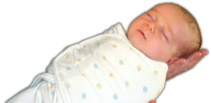 swaddled infant, sleeping peacefully